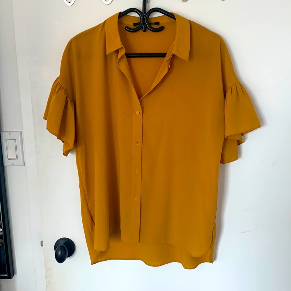 Dark yellow blouse with ruffled sleeves